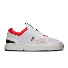 a white and red sneaker with black accents on the upper part of the shoe