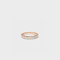 This bezel set band can be the perfect addition to your bridal stack, or shine on its own! Luxury Baguette Cut Half Eternity Stackable Rings, Luxury Rose Cut Diamonds Eternity Band For Formal Events, Formal Rose Cut Diamond Eternity Band, Formal Eternity Band With Rose Cut Diamonds, Classic Eternity Band With Rose Cut Diamonds For Promise, Luxury Gold Stackable Rings With Channel Set, Gold Luxury Stackable Rings With Channel Set, Luxury Gold Stackable Rings Channel Set, Luxury Stackable Baguette Cut Eternity Band