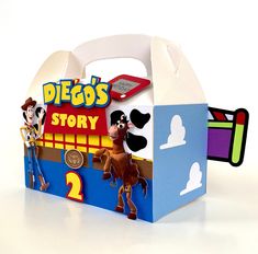 a cardboard toy story box with woody and friends on the front, sitting on a white surface