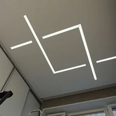 the ceiling is painted gray with white lines