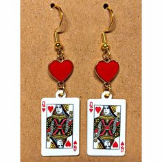 These card charms pair perfectly with the red heart connector charms! These are definitely one of my favorite pairs that I've made. Only one available! The materials are all metal, no plastic, and the earring wires are hypoallergenic. Queen Of Hearts Earrings, Hearts Earrings, Queen Jewelry, King Of Hearts, Earring Wires, Earrings Red, Red Earrings, Earrings Statement, Queen Of Hearts