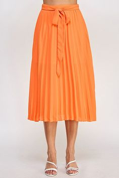 Elegant Orange Skirt For Work, Relaxed Fit Belted Pleated Skirt, Orange Lined Skirt For Work, Spring Belted Skirt, Orange Pleated Skirt For Party, Orange Pleated Party Skirt, Belted Pleated Midi Skirt, Orange Skirt For Workwear In Summer, Spring Flared Belted Skirt