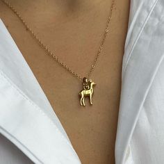 Who says you can't bring a bit of the wild into your jewelry collection? This handmade necklace features a delightful deer pendant, lovingly crafted from Silver 925 and plated with a thick, 22k gold vermeil layer. Deer Pendant, Deer Necklace, Dog Pendant, Pendant Silver, Handmade Necklace, 22k Gold, Handmade Necklaces, Gold Vermeil, The Wild