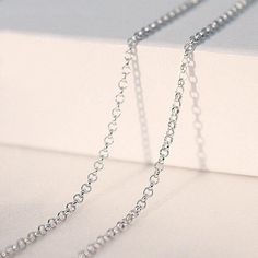 silver Silver Charm Necklaces With Adjustable Oval Link Chain, Gift Oval Pendant Chain Necklace With Adjustable Chain, Silver Link Chain Necklace For Gift, Gift Silver Link Chain Necklace, Oval Pendant Necklace With Rolo Chain As Gift, Oval Pendant Necklace With Rolo Chain For Gift, Gift Necklace With Oval Pendant And Rolo Chain, Oval Link Rolo Chain Necklace As Gift, Silver Rolo Chain Necklace