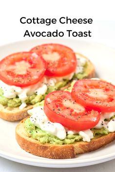 two slices of bread with tomatoes and avocado on top, sitting on a white plate