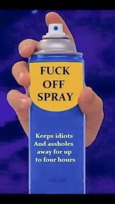 a hand holding a spray can with the words f k off spray on it's side