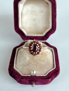 Vintage 9ct yellow gold garnet cluster ring The item comes without the box in the photos, but will be presented in a Gembank1973 gift box. Weight - 3g Ring Size - UK R Measurements - head of ring 12x11 Materials - 9ct gold Hallmarks - Rubbed away - please refer to images Condition - the overall condition is very good Office use - H2 Thanks for looking :) Red Rings Engagement, Gold Cluster Ruby Ring As Gift, Heirloom Cluster Ring Gift, Antique 14k Gold Cluster Ring Gift, Antique Oval Cluster Ring As Gift, Antique Oval Cluster Ring For Gift, Cluster Ruby Ring In 14k Gold As Gift, 14k Gold Cluster Ruby Ring For Gift, 14k Gold Cluster Ruby Ring As Gift