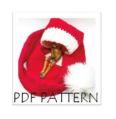 a knitted santa hat with a doll in it and the text, free crochet pattern