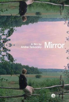 the movie mirror is shown with two people sitting on a tree branch