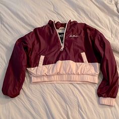 You Absolutely Will Love This Stunning New Without Tags Hollister Pullover. It Is Maroon & Pink With Jersey Gray Interior. It Is Adorned With A Zip Closure Mock Neck, Kangaroo Pocket With Snap Closure , Elastic Waist, Perfect For Exercise Or Just Lounging Around. It’s Light Weight & Looks Fabulous With A Cute Hat & Scarf. Perfect For All Seasons. Size Small. Measurements: Waist: 17” Across Shoulder To Shoulder: 23” Shoulder To Waist: 18 1/2” Arm Length: 18 1/2” Armpit To Wrist Hollister Jackets, Cute Hat, Gray Interior, Hat Scarf, Snow Jacket, Cute Hats, All Seasons, Kangaroo Pocket, Snap Closure