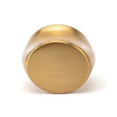 an image of a gold knob on a white background