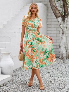 Make a statement with the Gemma Floral Midi Dress. Featuring a vibrant tropical print, this dress is perfect for adding a playful touch to any outfit. With a flattering midi length, it's sure to turn heads and keep you feeling confident all day long. Say aloha to your new go-to vacation dress! Size Guide: Tina is 5’65” tall, and has a 33.6” bust, 24.1” waist, & 35.2” hips. She is wearing a S / US 4 / AU 8. This dress is true to size. Material: 100% Polyester. Feature: V-neckline. Midi length. Short Sleeve. Relax fit. Care Instructions: Machine wash / Cold hand wash Reindeer Headband, Vacation Dress, Feeling Confident, Vacation Dresses, Daily Dress, Dress Jewelry, Floral Midi Dress, Tropical Print, Midi Length