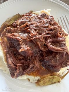 The slow cooker makes this fall-apart, easy Mississippi Roast smothered in rich gravy melt in your mouth. And the best part? This dump and go recipe requires almost no prep time!