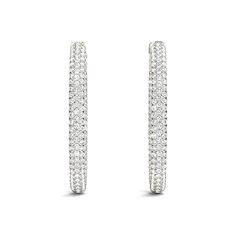 Sparkle and shine with these stunning 4.40 ctw Diamond Hoop Earrings. The pave set diamonds are placed inside and out, giving you twice the brilliance. Elevate any outfit and make a statement with these elegant earrings. A must-have for any jewelry collection. Formal White Halo Hoop Earrings, White Halo Hoop Earrings For Formal Occasions, Diamond White Pave Hoop Earrings, Diamond White Hoop Earrings With Pave Setting, Dazzling Pave Setting Hoop Earrings, White Pave Setting Hoop Earrings, White Pave Hoop Earrings For Wedding, White Hoop Earrings With Pave Setting, White Hoop Earrings With Halo Detail