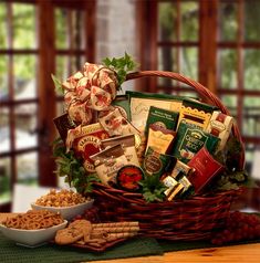 a basket filled with snacks and crackers on top of a table