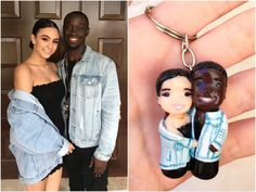 a man and woman are holding key chains in front of a door with the same photo