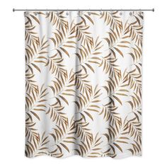 a white shower curtain with brown leaves on it