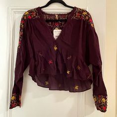 Free People Cropped Blouse Dark Brown With Floral Embroidery, Nwt Size Small Peasant Blouse With Floral Embroidery, Peasant Blouse With Floral Embroidery And Long Sleeves, Fall Long Sleeve Tops With Chikankari Embroidery, Long Sleeve Peasant Top With Intricate Embroidery For Fall, Long Sleeve Tops With Chikankari Embroidery For Fall, Embroidered Long Sleeve Cotton Blouse, Embroidered Long Sleeve Cotton Blouse Piece, Bohemian Embroidered Long Sleeve Blouse, Fall Peasant Blouse With Floral Embroidery