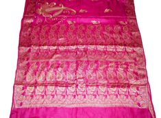 About this item Look At The Intricacy Of The Work On This Heavy Saree Which Is Fully Handmadei Embroidery . Overall Design Is So Amazing That Its Difficult To Take Your Eyes Off From This Beautiful Master Piece. Base Fabric Is Pink Color Pure Silk Over Which Antique Floral Embroidery And Dabka Work Along With Sequins Work In Combination Of Silver, Golden, Green And Red Color Is Done. The Sparkling White AD Stones Are Giving A Mesmerizing Effect To The Saree. Golden And White Glass Beads Work Is Ceremonial Pink Dupatta With Zari Work, Embroidered Saree Shawl For Celebrations, Wedding Banarasi Silk Shawl With Embroidery, Bollywood Wedding Shawl With Traditional Patterns, Bollywood Style Wedding Shawl With Traditional Patterns, Pink Saree With Motifs For Celebration, Traditional Patterned Shawl For Wedding And Festive Season, Embroidered Tussar Silk Shawl For Wedding, Traditional Pink Saree For Ceremonial Occasion