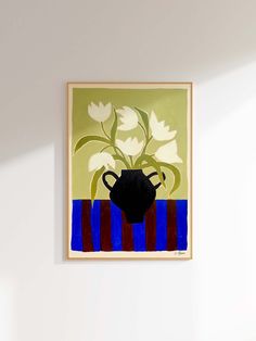 a painting hanging on the wall next to a vase with flowers in it and blue stripes