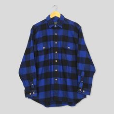 Vintage Field & Stream Plaid Checkered Flannel Shirt Medium Blue Checked Tartan Workwear Shirt Grunge Indie Boho Heavy Button Up Size M Good Used Condition. No Stains and No Holes Size (On Tag) : Size M **To make sure if it FITS YOU, refer at the exact measurements. Size Measurement (All measurements were taken lying flat) : Width [armpit to armpit] : 23 inches / 58 cm Length [shoulder to end of garment] : 30 inches / 76 cm THIS IS USED CLOTHING! PLEASE DON`T EXPECTED IT TO BE LIKE NEW OR DON`T Blue Flannel Shirt, Vintage Flannel Shirt, Checkered Shirt, Check Shirt, Black Plaid, Used Clothing, Blue Plaid, Flannel Shirt, Medium Blue