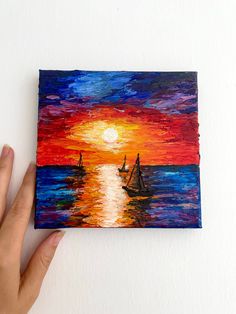 a painting of sailboats in the ocean at sunset, painted with acrylic paint