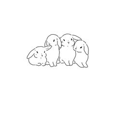 three rabbits sitting next to each other on a white background