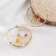 Brand New Gold Plated 3d Mushroom Hoop Earrings. High Quality Delicate Earrings With Cute Details. Will Make A Perfect Gift For Your Girlfriend, Daughter, Granddaughter And Anyone Who Loves Nature! Size Of Earrings Is 38 X 36mm. Check Out My Store For More Unique Jewelry Pieces - For Both Women, Men And Pets. No Lowball Offers Bundle With More Items And Save Tags Boho Jewelry Boho Earrings Magic Mushroom Gold Mushroom Necklace Crystal Mushroom Indie Jewelry Mushie Earrings Mushie Jewelry Mushroom Accessories, Unique Hoop Earrings, Plant Earrings, Unique Earring, Mushroom Jewelry, Hammered Jewelry, Mushroom Earrings, Cute Mushroom, Sweet Earrings