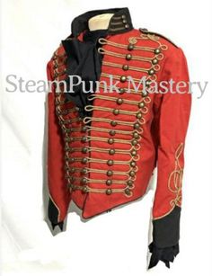 Ceremonial Men’s Military style Red/Black Jacket With Front gold Braiding jacket with black cotton ruffle shirt.This is a heavy cotton Military style jacket, it is fitted well tailored made jacket with antique brass buttons and lots of details on sleeves and collars and jacket is fully lined with black satin.Please refer to photos.Jacket is available in 44”and 46” chest sizeL - to fit chest 44” (armhole To armhole 46”)XL - 46” (armhole To armhole 48”)Front Length is 24” approximately Back length Cotton Costume Outerwear For Fall, Fall Cotton Costume Outerwear, Fitted Cotton Punk Outerwear, Vintage Red Outerwear For Costume Party, Red Vintage Outerwear For Costume Party, Red Military Long Sleeve Outerwear, Costume Outerwear With Epaulettes And Long Sleeves, Black Parade Jacket, Steampunk Man