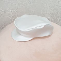 Introducing our exquisite Baby Newsboy Cap, the perfect accessory for any special event, be it a Christening, Baptism, or Blessing. This charming and sophisticated hat will make your little one look absolutely adorable and distinguished. Handmade with love, each cap is crafted from luxurious silk, one of the world's most opulent textiles. The cap not only enhances the noble and elegant nature of baptismal attire but also creates a timeless keepsake to remember this momentous occasion. ☑ Why Choo White Adjustable Hat For Baptism, White Bonnet Gift, One Size Fits Most, White Bonnet Gift (one Size Fits Most), White Bonnet, One Size Fits Most, Gift, Elegant White Flat Cap, Hat For Boys, Beret Style, Flat Hat, Baby Boy Baptism