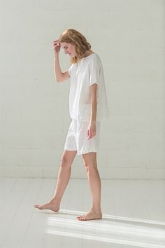 "DETAILS: * Natural linen, hypoallergenic pajama set * Loose top and pajama shorts with elastic band waist * Great gift for women, bride, girlfriend. * Made from soft wash medium weight (185 g) 100 % European linen fabric * The length of linen top is +/- 60 cm (23.62\"). * The length of linen shorts laying down on the floor is +/- 44 cm (17.32\"). * Height of the model is 177 cm (5' 8\") and she is wearing size XS/S * Color - white. Please choose another color and size on the right * Product num Linen Pajamas, Women Sleepwear, Women Bride, Linen Loungewear, Great Gifts For Women, Loose Top, European Linens, Womens Pyjama Sets, Pajamas Set