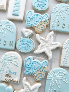 decorated cookies are displayed on a table