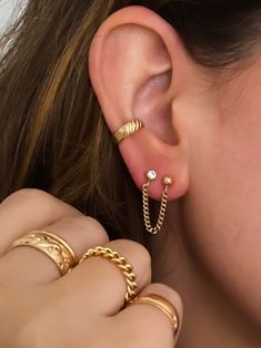 Looking for some edge and a bold look? Add this cuff to your ear stack, no piercing required. Slide onto the conch part of your ear and go. 14k gold filled 3mm width *How to place an ear cuff - a cuff will not fall off if placed correctly. Start by sliding the ear cuff over the top part of your ear ( the thinnest cartilage part) then slide down onto the lower conch. Gently tug to make sure it does not come off. Adjustable Gold-plated Tarnish-resistant Ear Cuff, Dainty 14k Gold Ear Cuff For Everyday, Dainty Tarnish-resistant Ear Cuff For Everyday, Everyday 14k Gold Hypoallergenic Ear Cuff, Hypoallergenic 14k Gold Ear Cuff For Everyday, Minimalist Gold Plated Ear Cuff Tarnish Resistant, Minimalist Gold Plated Tarnish Resistant Ear Cuff, Trendy Yellow Gold Tarnish Resistant Ear Cuff, Trendy Tarnish Resistant Yellow Gold Ear Cuff