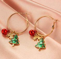 Our Christmas tree, present and bell charm earrings are the perfect blend of festive and fashionable, making them the ultimate accessory for your holiday wardrobe. Christmas Party Jewelry, Compass Bracelet, Whale Necklace, Shark Earrings, Hook Necklace, Bracelet Viking, Dolphin Earrings, Starfish Bracelet, Surfer Necklace