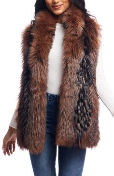 Brace yourself for chilly weather in a luxuriously soft and fluffy faux-fur vest framed by an ultracozy shawl collar and finished with velvet-lined pockets. 26" length Front hook-and-eye closure Stand collar On-seam pockets Lined 100% acrylic or 100% polyester faux fur with 100% polyester back Machine wash, line dry Imported Fur Vest Outfits, Fall Fashions, Fabulous Furs, Brace Yourself, Faux Fur Vest, Faux Fur Vests, Chilly Weather, Leather Shorts, Fur Vest