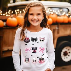 Halloween Coquette Bows Girls Tee Shirt, Pumpkin and Bats Girls Tee, Ghost Toddler Tee, Youth T-Shirt, Girls T-Shirt Gift 100% Polyester-Feels like super soft Cotton. Design will not fade.  Shirt will not shrink. Washing Instructions: Turn garment inside out. Machine wash COLD with mild detergent. NO bleach. Dry at a normal dryer setting on household machines. Do not dry clean. Instructions apply to the material only, please follow garment washing instructions as well.. White Tops With Character Print For Fall, Cute White Tops For Halloween, Playful Cotton Tops For Halloween, Pink Halloween T-shirt With Letter Print, Short Sleeve Cotton T-shirt With Bow Print, Kawaii Short Sleeve Halloween T-shirt, Purple Halloween Graphic Tee T-shirt, Pink Halloween T-shirt With Character Print, Girls Tees