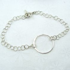 Halo Silver Circle Bracelet $28.00 https://cloverleafjewelry.com Everyday Chain Bracelet With Sterling Silver Clasp, Everyday Sterling Silver Round Chain Bracelet, Sterling Silver Round Bracelet For Everyday, Sterling Silver Bracelet With Toggle Clasp Gift, Sterling Silver Round Bracelet With Toggle Clasp For Gift, Sterling Silver Toggle Clasp Bracelet Gift, Sterling Silver Hammered Bracelets, Hammered Sterling Silver Bracelets, Hammered Sterling Silver Round Bracelets