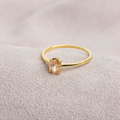 Citrine stone is believed to represent abundance and fertility. Our citrine ring has a stylish design and is suitable for daily use. A nice gift that can make you and your loved ones happy. The birthstone of those born in November is Citrine. F E A T U R E S * Made to Order. * Gold KT: 14K * Gold Color: Yellow Gold, Rose Gold, White Gold * Citrine Carat: 0.70 ct. * Stone Height: 7,00 mm / 0.28 inch * Stone Width: 5,00 mm / 0.20 inch * Setting Type: Bezel Setting * Ready to Ship in 1-3 Business Days * 100% US sourced * 2 Years Warranty * Free Express International Shipping * Free returns within 14 days from the order date Oval Cut 14K Solid Gold Citrine Ring, Mother's Day Gift, 14K Gold Birthstone Ring, Oval Cut Citrine Ring, Women's Jewelry, Minimalist Ring We loved making our jewelry with Gold Topaz Birthstone Promise Ring, Classic Topaz Birthstone Ring For Gift, Elegant Citrine Crystal Ring With Birthstone, Elegant Citrine Birthstone Crystal Ring, Elegant Citrine Birthstone Promise Ring, Oval Gold Crystal Promise Ring, Classic Topaz Crystal Ring As A Gift, Minimalist Topaz Rings As Gifts, Gold Topaz Birthstone Ring Gift