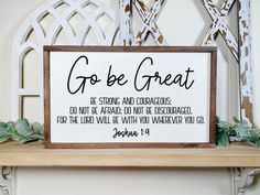 a wooden sign that says go be great on top of a shelf with greenery