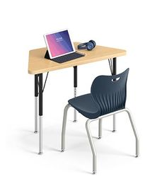 a laptop computer sitting on top of a wooden desk next to a blue plastic chair