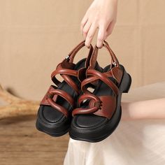 Style And Comfort Go Hand In Hand With The Capri Sandal. Hand Made With Premium Cowhide Upper. A Statement Yet Casual Look That Completes Any Outfit. Color: Black/CoffeeMaterial: CowhideLining: Genuine LeatherInsole: Genuine LeatherSole: RubberHeels: 5cm/1.97" Fit: Medium to Wide, Runs Normal.Origin: Made in China Production Time: About 5-7 days (Any exceptional case will email you, Please pay attention to your email left)Shipping Time: Free Shipping To most locations, delivery time is approxima Brown Platform Sandals With Round Toe, Trendy Brown Open Toe Sandals, Trendy Brown Open Toe Slingback Sandals, Brown Flat Heel Platform Slingback Sandals, Brown Platform Flat Heel Slingback Sandals, Trendy Brown Ankle Strap Sandals, Trendy Brown Flat Slingback Sandals, Brown Flat Platform Sandals, Brown Round Toe Wedge Sandals With Buckle