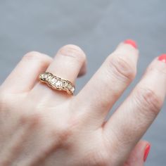 Yellow-hued diamond baguettes scatter across this V-shaped ring by Ellis Mhairi Cameron. Each stone is hand set in softly distressed gold, shining like buried treasure. Ellis draws inspiration from the medieval jewelry hoards found in Scotland. Her rings are unique, beautiful, and mysterious. Stones: Total .85tcw Yellow Baguette DiamondsMetal: 14k Yellow GoldMeasurements: Setting length: 18.9mm, Setting width: 8.5mm, Setting height: 2.9-2.1mm, Band width: 1.6-2.4mm Size 6, 6.5 in stock Shipping Wolf Jewelry, Buried Treasure, Medieval Jewelry, Baguette Diamond, Pearl Studs, Pearl Drop Earrings, Pearl Drop, V Shape, Pearl White