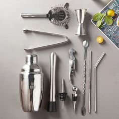 various kitchen utensils are laid out on a table