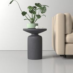 a living room with a couch, chair and potted plant on the side table