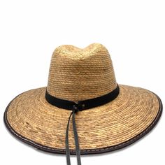 Shape: Panama Hat, Indiana Style Material: Straw, Palm, Sahuayo PalmSize: Medium Color: BurntDetail: Leather bandHat Care: Always handle your hat by the top. Do not place hat with brim on the surface, it will cause it to flatten the brim. Always Brim turned up.To dust off, use a soft brush.To remove stains, wipe with a cloth, then let it dry naturally with the brim turned up.Steam it to shape if necessary.Misshapen flat brim straw hats can be shaped carefully with a lukewarm - not hot - steam ir Country Style Toquilla Straw Hat For Travel, Toquilla Straw Fedora With Curved Brim, Short Brim Toquilla Straw Panama Hat, Country Style Straw Hat With Short Brim For Travel, Toquilla Straw Panama Hat With Short Brim, Country Style Short Brim Straw Hat For Travel, Country Style Straw Brimmed Hats, Natural Boater Hat With Short Brim For Outdoor, Natural Color Outdoor Hat, One Size Fits Most