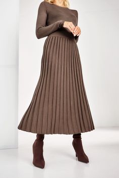 Elegant and modest knit skirt is made of high quality Italian yarn which consists of 60% cotton and 40% viscose The skirt is for spring and summer season Pleated imitation looks eye catching and always trendy - skirt length is 31,4 inches or 80 cm - elastic waist band Sizes  Available in 2 sizes,the recommended measurements are 4/6 US numeric WAIST 26-29 inches or 66-74 cm HIPS 35-38,5 inches or 90-98cm 8/10 US numeric WAIST 30-33 inches or 78-85 cm HIPS 40-43 inches or 102-110 cm RETURNS and EXCHANGES I gladly accept returns, exchanges and cancellations Contact me within: 7 days of delivery Dispatch items back within: 14 days of delivery Request a cancellation within: 6 hours of purchase Conditions of return Buyers are responsible for return postage costs. If the item is not returned in i Knitted Skirts For Women, Pleated Skirt Fall Outfit, Brown Knit Skirt, Pleated Skirt Fall, Warm Skirt, Midi Pleated Skirt, Warm Skirts, Skirt For Fall, Skirt Outfits Fall