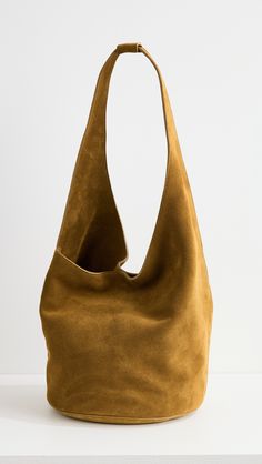 Fast Free Shipping & Free Returns on Reformation Medium Silvana Bucket Bag at Shopbop. Shop new arrivals from Reformation at Shopbop.com Luxury Suede Shoulder Bag With Palladium Hardware, Chic Suede Hobo Bag With Removable Pouch, Chic Suede Hobo Bag With Suede Lining, Modern Suede Tote Hobo Bag, Elegant Brown Hobo Bag With Suede Lining, Elegant Suede Hobo Bag With Suede Lining, Modern Suede Shoulder Bag With Removable Pouch, Luxury Suede Hobo Bag With Soft Leather, Modern Hobo Bag With Suede Lining For Daily Use