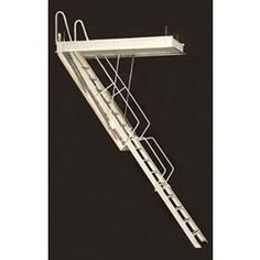 a white fire escape ladder against a black background