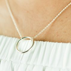 Circle Necklace in Sterling Silver. This Centred Circle Necklace symbolizes Unity, Family, Circle of Friends, Wholeness, Karma, the Sun & Moon, Strength, Circle of Life, Balance.  Simple yet very trendy and great for everyday wear and the prefect bridesmaids Gift, anniversary gift, friendship gift. DIMENSIONS: 15mm Thickness: 2mm Finish:  Bright shine 🎁 A gift box The item will be sent in a beautiful gift box ready to give as a gift. If you purchase it as a gift, I can include your note on the Everyday Sterling Silver Round Charm Necklaces, Everyday Round Sterling Silver Charm Necklace, Everyday Clavicle Chain Jewelry, Circle Jewelry With Adjustable Chain For Everyday, Simple Round Everyday Necklace, Simple Everyday Round Necklace, Adjustable Circle Chain Jewelry For Everyday, Minimalist Nickel Free Necklace For Her, Minimalist Nickel Free Charm Necklaces For Everyday