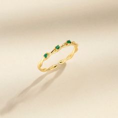 ● A 3 stone green zircon ring is truly meaningful. Not only the gemstone birthstone for those born in December, it also represents the past, present and future as well as being known as the happiness stone! What better gift for a loved one. ● The geometric zirconia ring is dainty and elegant but very versatile. It can be worn from day to night and casual to formal, making this a wonderful staple in any discerning lady's jewelry collection. J E W E L R Y ∙ D E T A I L * 3 stones zircon ring * Adjustable ring * Sterling silver 925 * Symbolizes happiness * Representing past, future & present * Lead, zinc & nickel free * Arrives in gift box ready for gift giving Green Dainty Crystal Ring With Birthstone, Green Crystal Ring For May Birthstone, Minimalist Green Crystal Promise Ring, Dainty Green Birthstone Open Ring, Green Crystal Gemstone Ring Minimalist Style, Green Crystal Minimalist Ring With Gemstone, Emerald Open Ring For May Birthstone, Green Toe Ring For Promise, Minimalist Green Crystal Gemstone Ring